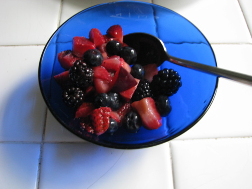 fruit salad strawberries blueberries plum blackberries