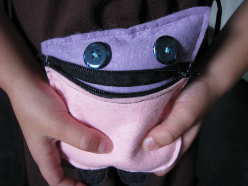 monster stuffie character wool felt button eyes and zipper mouth
