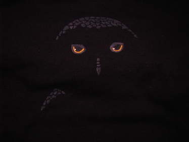 owl face hand-painted on black T-shirt