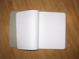 composition book with half blank and half lined pages