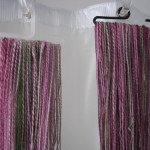 handspun yarn hanging to dry to set the twist