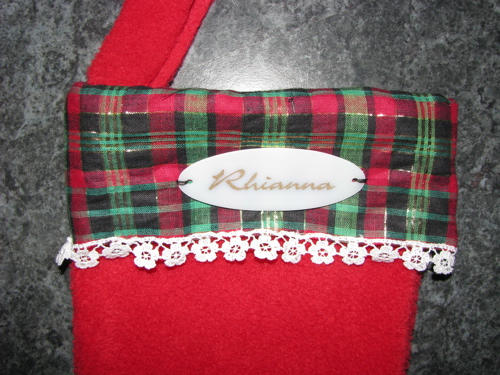 Christmas stocking with shrink plastic name tag