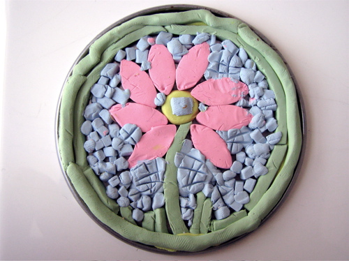 polymer clay sculpey mosaic flower on juice can lid