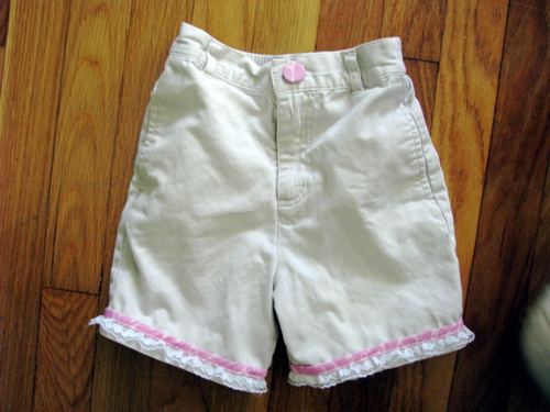 boys khaki shorts trimmed in pink fabric and lace for a girl