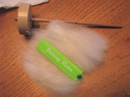 washed and combed alpaca lock fleece fiber spindle