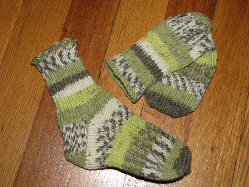 socks handknit from self-striping yarn