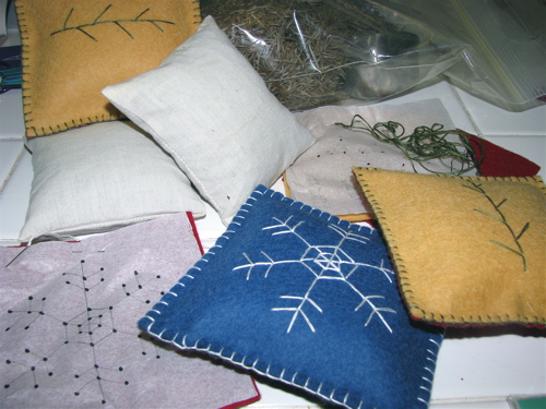 wool felt embroidered with cotton DMC floss balsam fir and snowflake design balsam needle sachet