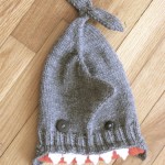 hand knitted shark hat with button eyes