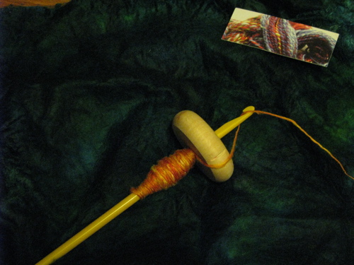 handspun silk on makeshift drop spindle