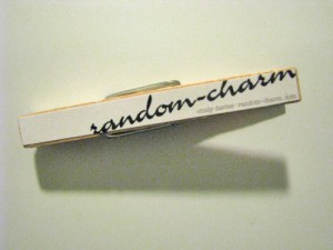 random-charm logo magnetic clothespin