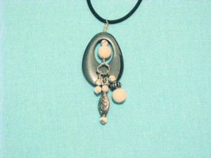 hematite oval and howlite beaded pendant