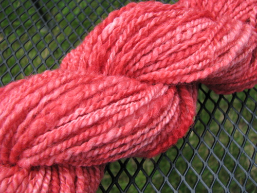 handspun BFL wool dyed with red Kool-Aid to a watermelon color
