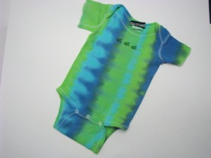 green and blue baby boy onesie with little frogs