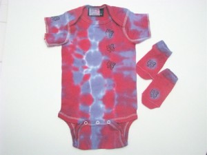 butterflies stamped on tie dye baby onesie and matching socks in pink and purple